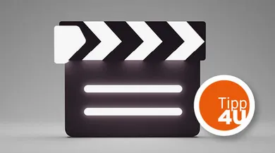 Geschlossene Filmklappe vor grauem Hintergrund