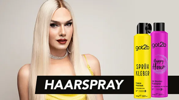 Werbung für got2b Haarspray mit einer Person mit langem, blondem Haar und rotem Lippenstift. Text 'HAARSPRAY' in der Mitte des Bildes. Rechts sind zwei got2b Produkte abgebildet: Sprühkleber in gelber Flasche und Happy Hour 24 Stunden Haarspray in pinker Flasche