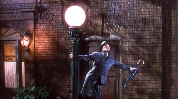 Gene Kelly tanzt im Regen in "Singing in the rain"